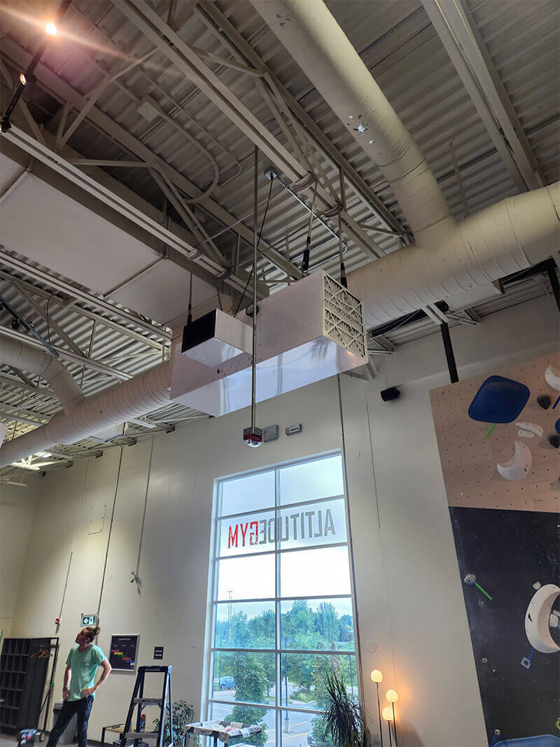 CleanLeaf OX3000 T-Style airflow pattern eliminating chalk dust and air contaminants in climbing gym.