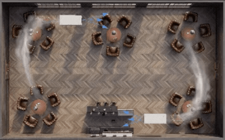 Top-down illustration of an indoor space with air filtration units creating circular airflow patterns to filter dust, fumes, and particles.