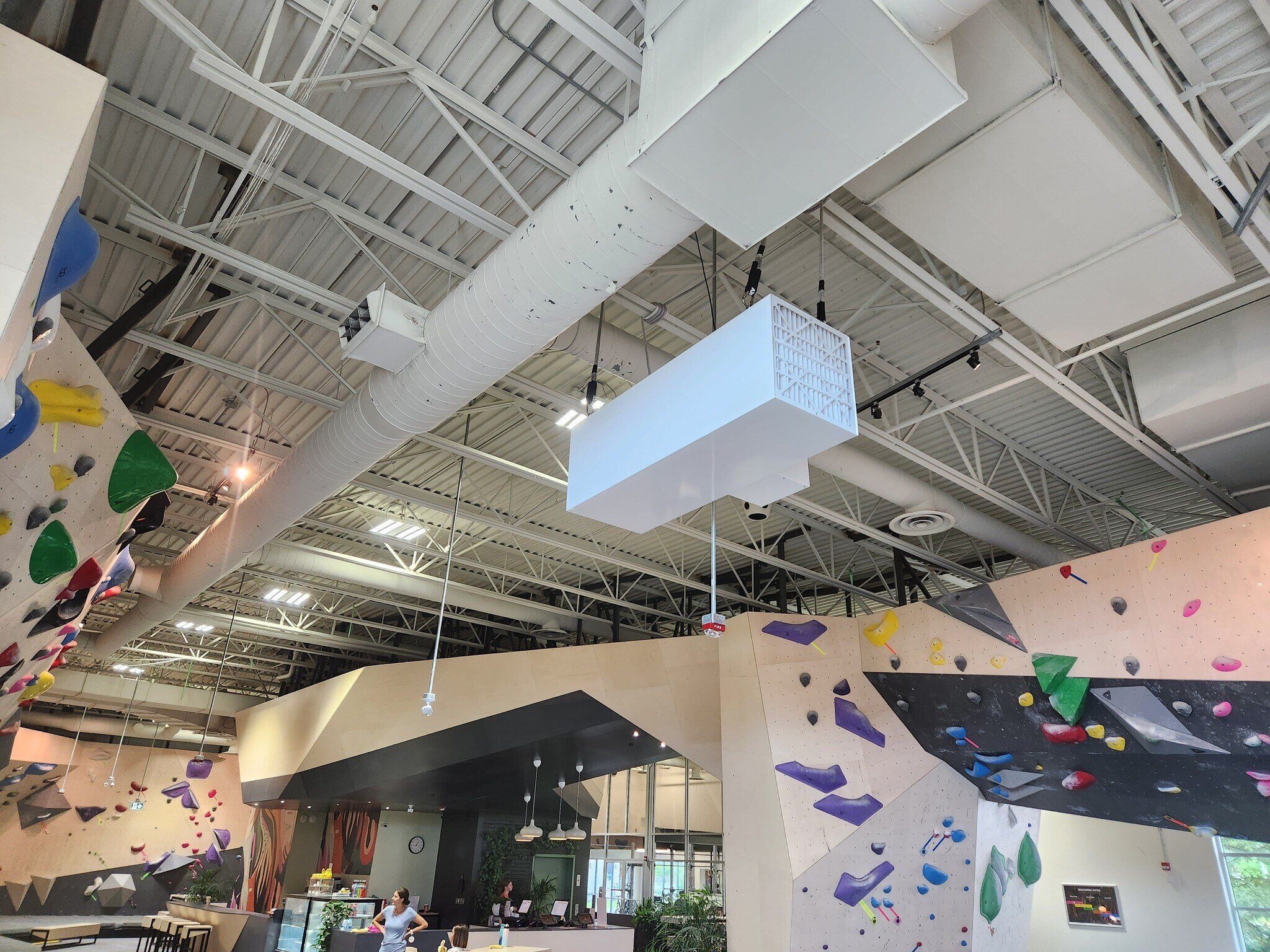 CleanLeaf OX3000 air filtration system controlling chalk dust at Altitude climbing gym.