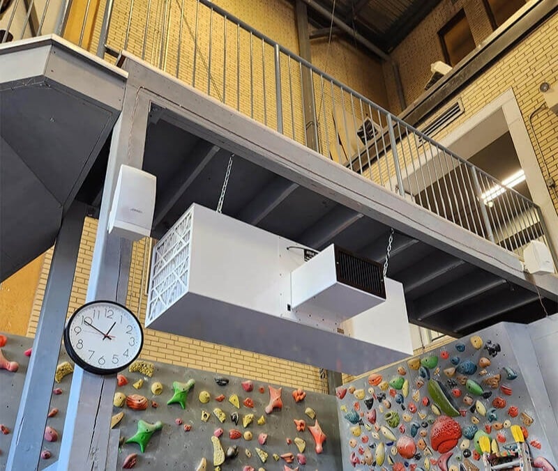CleanLeaf air filtration system installed in a commercial climbing gym controlling airborne chalk dust, particulate, and other air contaminants.
