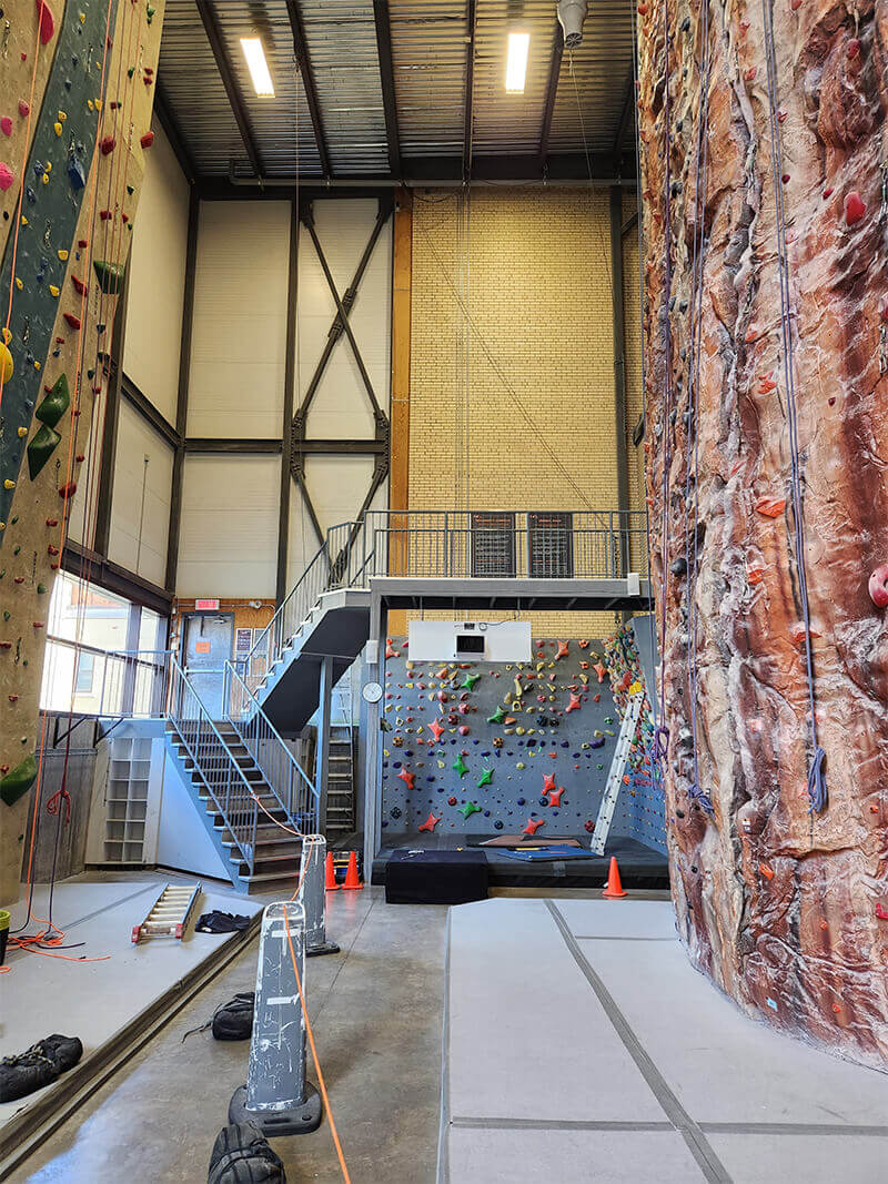 CleanLeaf commercial air filtration system installed in a climbing gym capturing chalk dust, airborne particulate, and biological contaminants to improve indoor air quality.